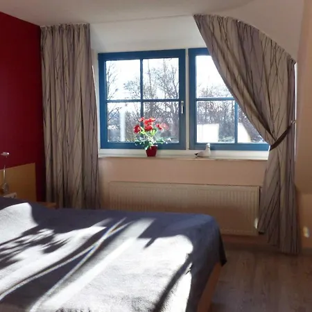 펜션 Behagliches Reetdachhaus Eibe 1